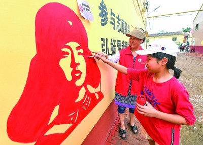 光明日报：志愿者在身边 温暖就在身边 ——各地各部门推进学雷锋志愿服务工作纪实